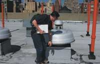 FAN CHECK: Padian checks all kitchen and bath exhaust fans. A little thing like a loose fan housing tells him how well mechanical systems are maintained.