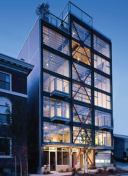 The eight units in the award-winning 1310 East Union Lofts in Seattle feature commercial storefront-style windows and concrete floors.