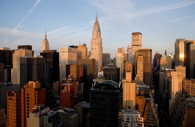 The sun rises on New York City
