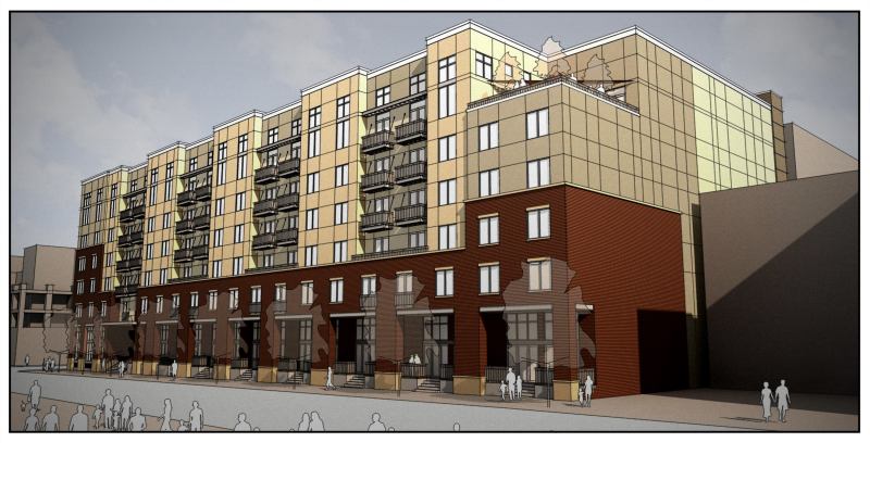 Broadstone Blake Street next to Coors Field in Denver, characterized by street-level entries, brick that matches the stadium, and rooftop views of the ballfield.