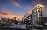 The 612 apartments at West Park were divided among two low-lying buildings to seem more intimate in scale. Different materials and colors further break up the masses.