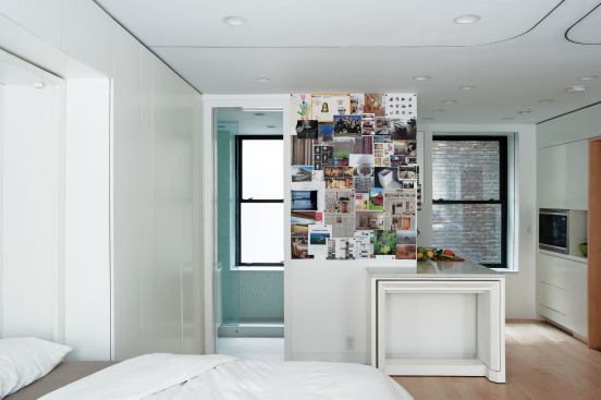 The prototype's kitchen features a small breakfast bar that houses a hidden dining table.
