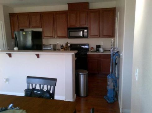 The Las Vegas townhome features new appliances and cherry wood laminate floors.