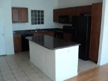 The condo offers 781 sq. feet of living space and is in a gated community.