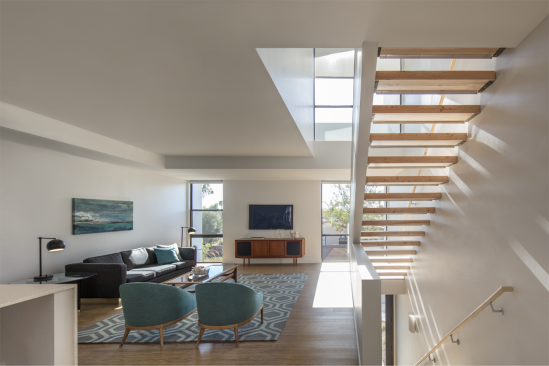 The interior of a three-story unit at artHAUS.