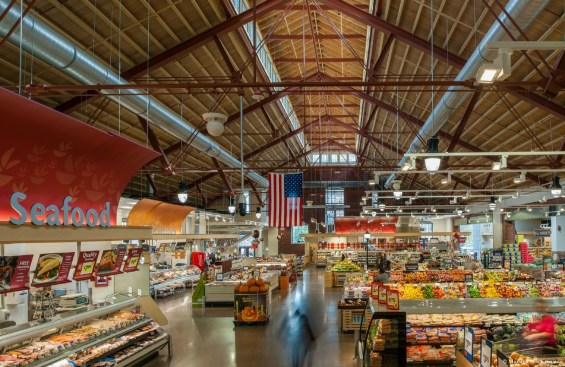 The design team blended old and new elements to create a grocery store with a modern industrial vibe that nodded to the market's historical roots.