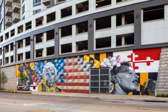 A colorful, bold mural honoring local heroes Edgar Allen Poe, Francis Scott Key, and Billie Holiday adds a lively vibe to the building and reflects the developers' interest in showcasing local artists' work.