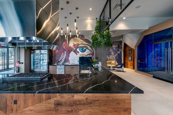 Residents at Three Collective enjoy a state-of-the-art demonstration kitchen where local chefs and restaurant partners teach cooking classes. Photography: Daniel O’Connor