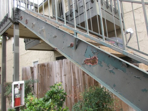 When inspecting exterior stairways for wear, examining the attachment mechanisms (bolts, anchors, screws, and/or nails) is as important as checking larger components.