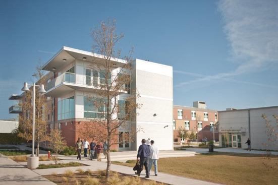 CAMPUS LIFE: Once an abandoned industrial lot, the Hope for Haven campus now includes mens (after photo) and womens dormitories, classrooms, and other facilities designed to help homeless San Antonio residents transform their lives.